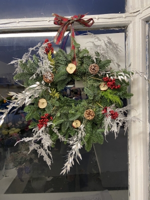 Silver and red door wreath